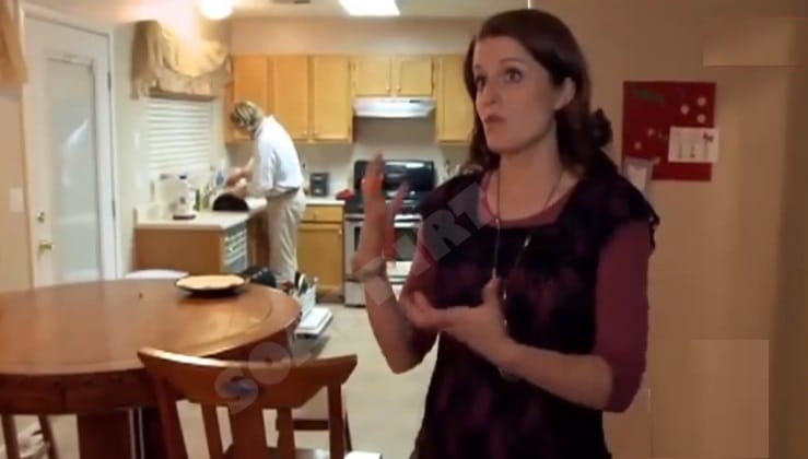 Fourth Wife Talks To Camera as Shared Hubby Does Dishes